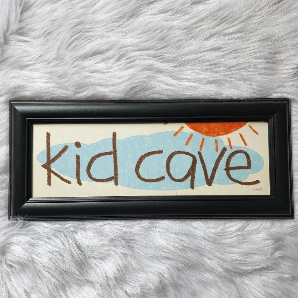Lauren Rader Kid‎ Cave black framed art print with sun & cloud